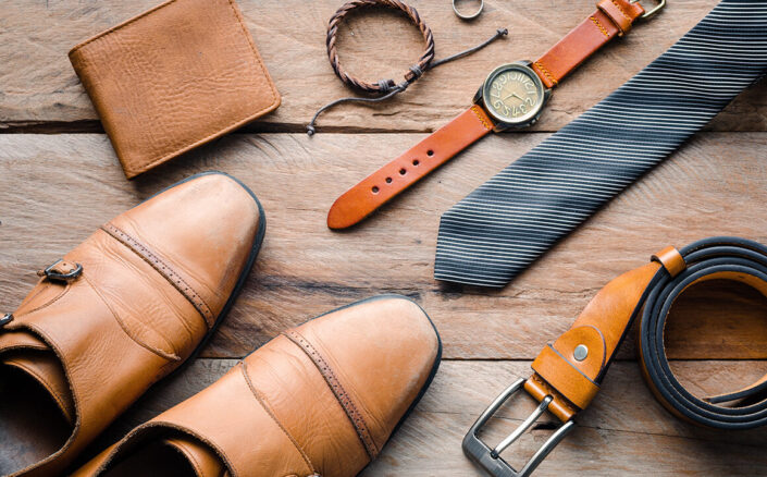 Male accessories. Leather shoes, watch, a tie, belt, bracelet