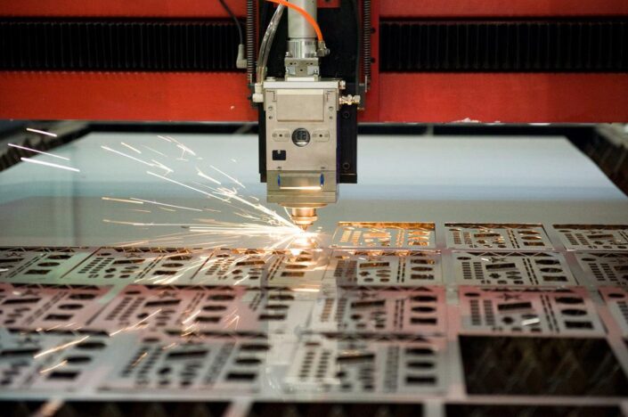 laser cutting machine engraving on a metal sheet
